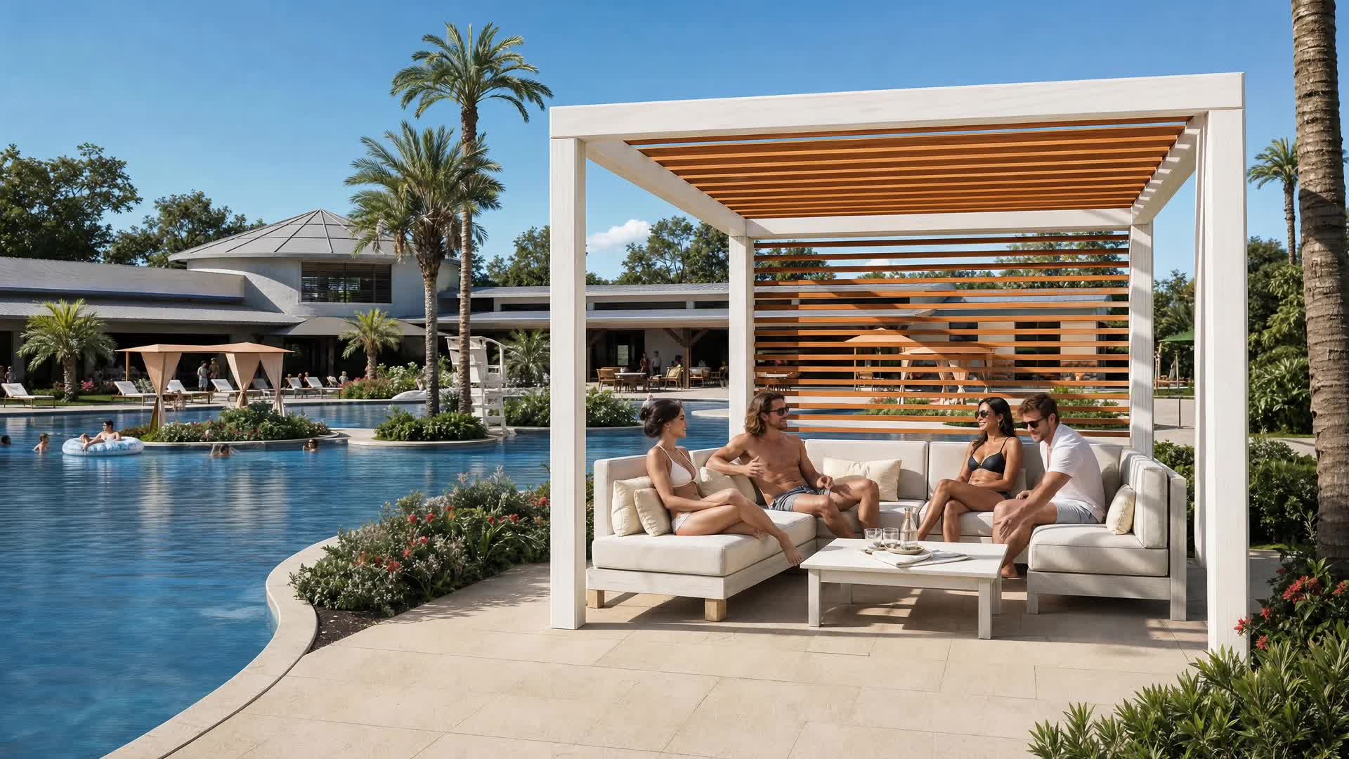 Members relaxing in a shaded cabana beside The Nest pool