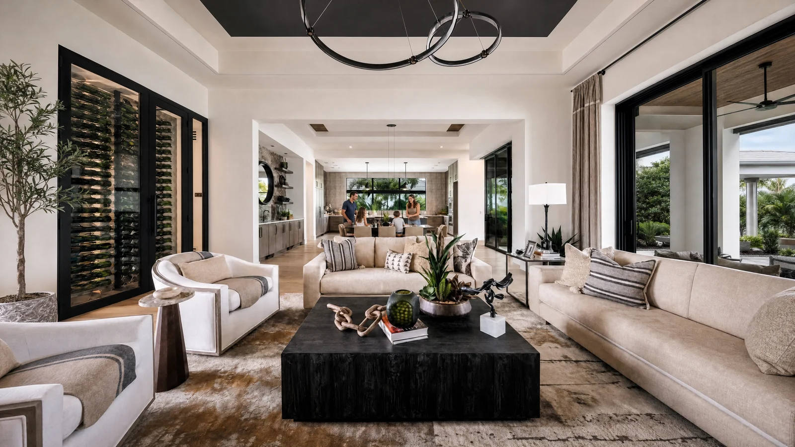 An airy living room with detailed ceilings and garden views